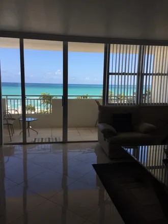 Rent this 1 bed condo on 3180 South Ocean Drive