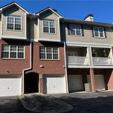 Buy this 3 bed townhouse on 8115 Woodland Lane in Alpharetta, GA 30009