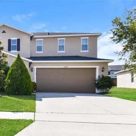 Rent this 3 bed house on 13509 Laranja St in Clermont, Florida