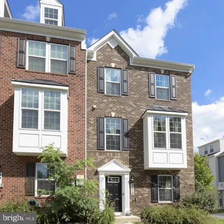 Rent this 4 bed townhouse on 9936 South Point Court in Owings Station, Calvert County