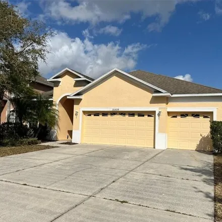 Rent this 4 bed house on 31429 Bridgegate Drive in Wesley Chapel, FL 33545