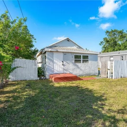 Buy this studio house on PMS Courier Service in West 15th Street, Riviera Beach