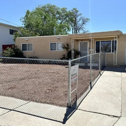 Buy this 4 bed house on 670 Claudine Street Northeast in Albuquerque, NM 87123