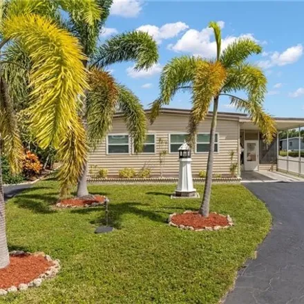 Buy this studio apartment on 598 Cape Florida Lane in Collier County, FL 34104