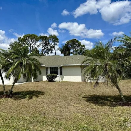 Rent this 3 bed house on 360 Southeast Greenway Terrace in Port Saint Lucie, FL 34983