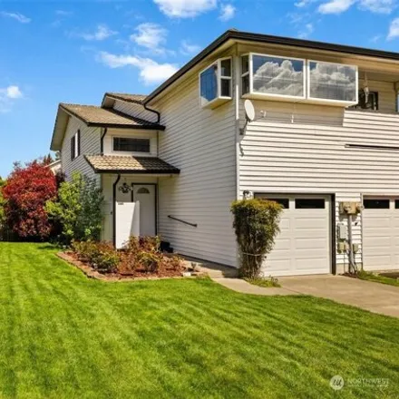 Buy this 3 bed house on 4114 Northeast 6th Place in Renton, WA 98059