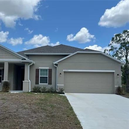 Rent this 3 bed house on 22092 Scarsdale Ave in Port Charlotte, Florida