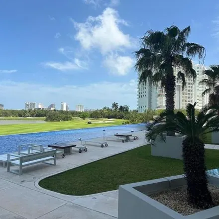 Rent this 3 bed apartment on Puerto Cancun Golf Course in Avenida Puerto Cancún, Distrito 2