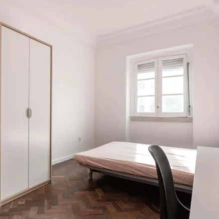 Rent this 7 bed room on Rua José Estevão 24 in 1150-192 Lisbon, Portugal