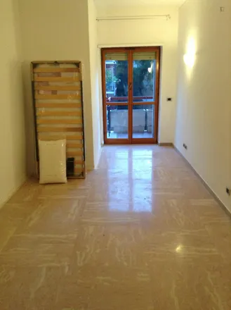 Rent this 6 bed room on Via Ignazio Guidi in 00014 Rome RM, Italy