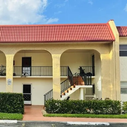 Rent this 2 bed condo on 346 Lake Frances Drive in Golden Lakes, Palm Beach County