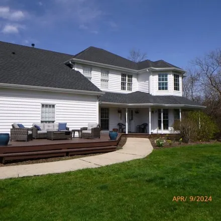 Buy this 4 bed house on Woodland Court in Warrenville, IL 60555