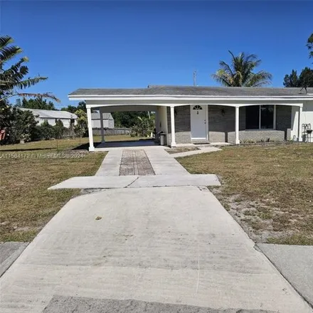 Buy this 2 bed house on 460 Northeast Riomar Drive in Saint Lucie County, FL 34952