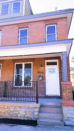 Rent this 3 bed townhouse on 719 Parsons Ave