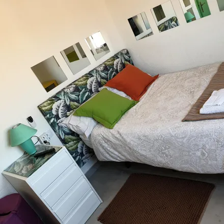 Rent this 4 bed room on Madrid in Calle Ernestina Manuel de Villena, 4