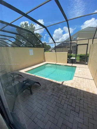 Rent this 3 bed townhouse on 2566 Maneshaw Lane in Osceola County, FL 34747