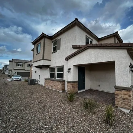 Rent this 4 bed house on Purdy Court in Las Vegas, NV 89166
