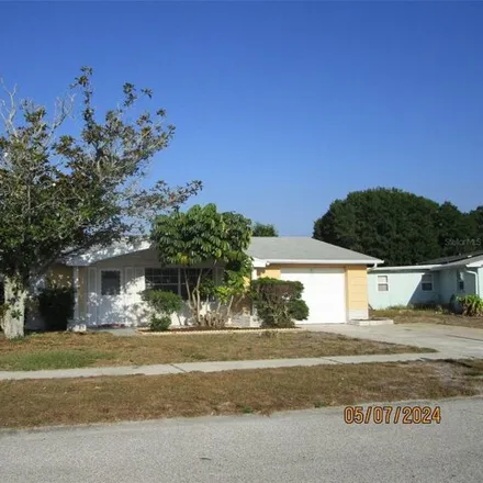 Rent this 3 bed house on 1124 Grand Boulevard in Holiday, FL 34690