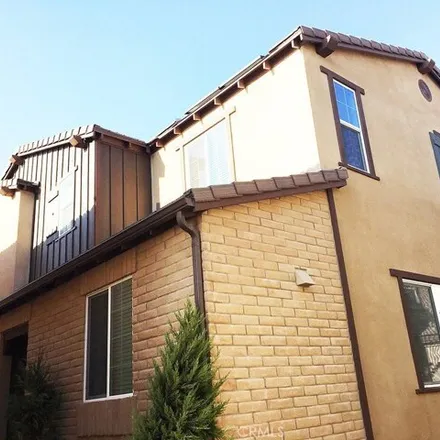 Rent this 4 bed house on 7143 Talasi Drive in Eastvale, CA 92880