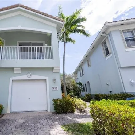 Buy this 2 bed townhouse on 3263 Laurel Ridge Circle in Riviera Beach, FL 33404