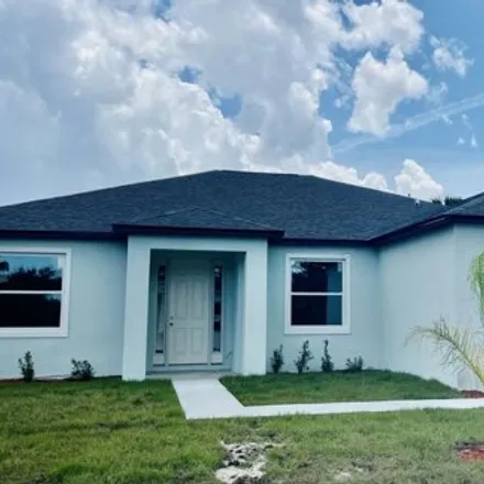 Buy this 4 bed house on 132 Norgrove Street in Palm Bay, FL 32909