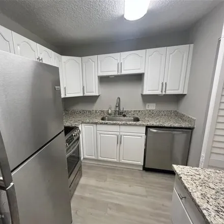 Rent this 1 bed condo on 733 Se 1st Way Apt 208 in Deerfield Beach, Florida