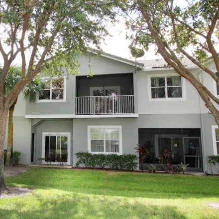 Rent this 3 bed townhouse on 3088 Grandiflori Drive in Park Pointe, Greenacres
