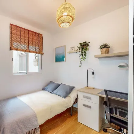 Rent this 5 bed room on Avinguda de la Malva-rosa in 64, 46011 Valencia