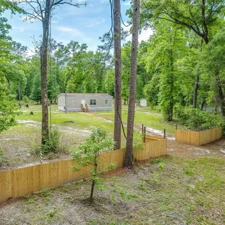 Buy this studio apartment on 72 Oakmont Drive in Wakulla County, FL 32327