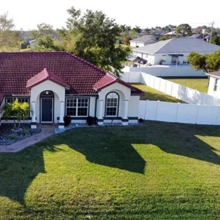 Buy this 4 bed house on 1480 Northwest 7th Place in Cape Coral, FL 33993