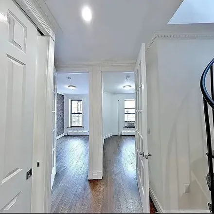 Rent this 4 bed apartment on 409 West 51st Street in New York, NY 10019