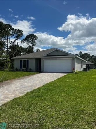 Rent this 4 bed house on 4099 35th Street Southwest in Lehigh Acres, FL 33976