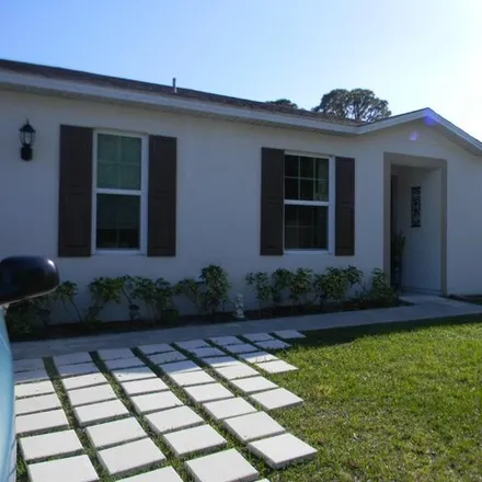 Buy this 4 bed house on 1581 Ranger Road Southeast in Palm Bay, FL 32909