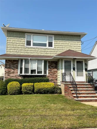 Buy this 5 bed townhouse on 76 Althouse Avenue in Village of East Rockaway, NY 11518