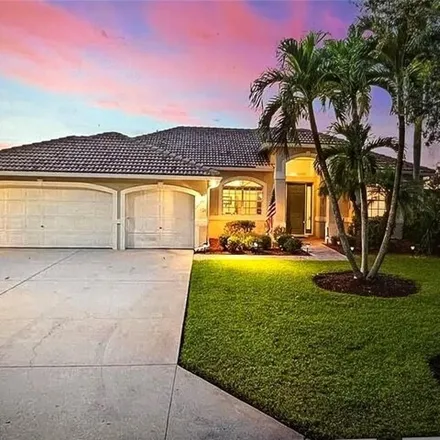 Rent this 3 bed house on 724 Grand Rapids Boulevard in Orangetree, Collier County