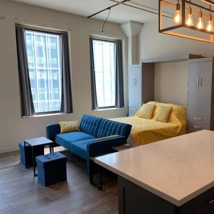 Rent this studio apartment on Capitol Lofts in 705 Main Street, Houston