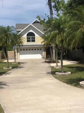 Rent this 3 bed house on 1405 South Riverside Drive in Edgewater, FL 32132
