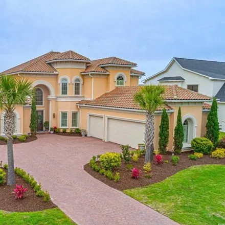 Buy this 5 bed house on 5208 Nightingale Dr Pt Unit Plantation in Myrtle Beach, South Carolina
