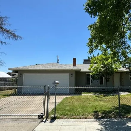 Buy this 3 bed house on 4646 East Lowe Avenue in Fresno, CA 93702