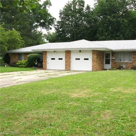 Buy this 4 bed house on 3865-3869 Santom Rd N in Stow, Ohio
