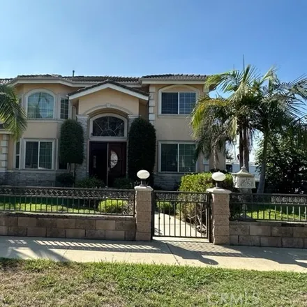 Rent this 4 bed house on 5898 Walnut Grove Avenue in El Monte, CA 91775