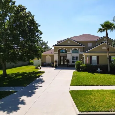 Buy this 4 bed house on 3344 Tumbling River Drive in Clermont, FL