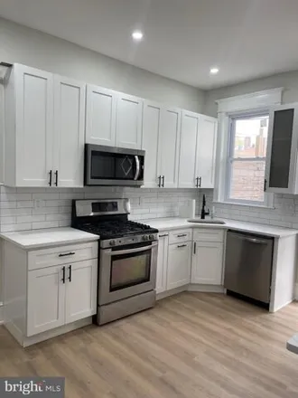 Rent this 3 bed house on 1129 South Divinity Street in Philadelphia, PA 19143
