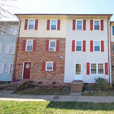 Rent this 4 bed townhouse on 1410 Country Club Ct.