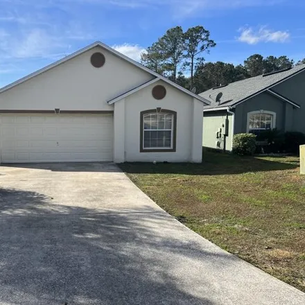 Rent this 3 bed house on 8440 Oak Crossing Drive West in Jacksonville, FL 32244