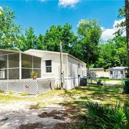 Buy this studio apartment on 4423 South Chirper Drive in Lecanto, Citrus County
