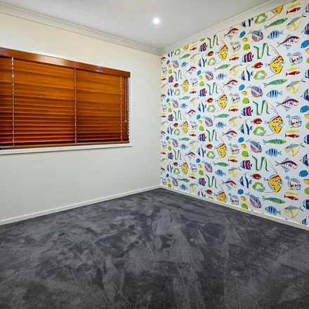 Rent this 4 bed apartment on Mitchell Street in Ormeau Hills QLD 4208, Australia