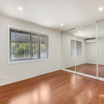 Rent this 1 bed apartment on 9 Rimfire Close in Bossley Park NSW 2176, Australia