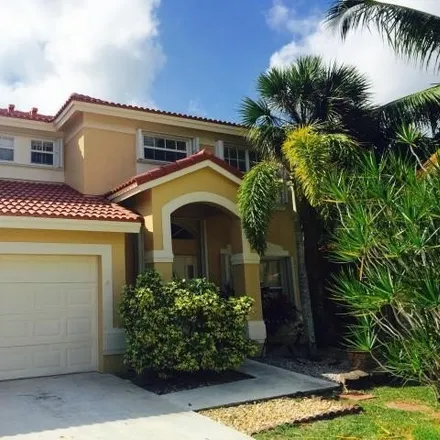 Rent this 4 bed house on 10752 Lake Oak Way in Boca Raton, Florida