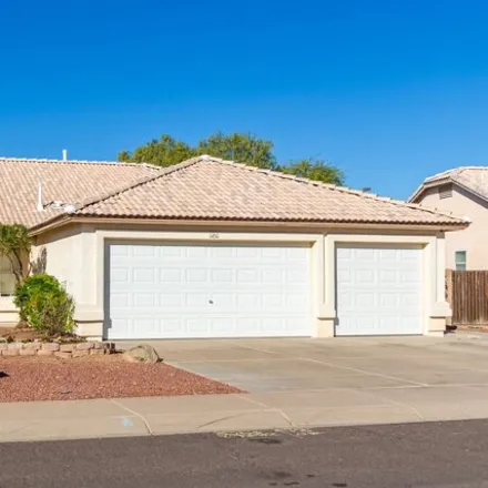 Buy this 4 bed house on 14511 West Wendover Drive in Surprise, AZ 85374